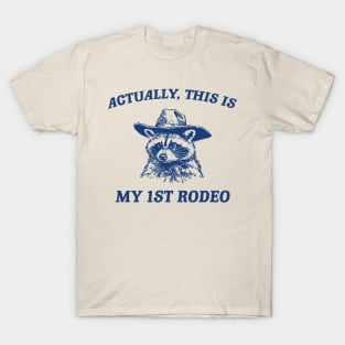 Raccoon Actually This Is My First Rodeo Shirt, Funny Trash Panda Meme T-Shirt